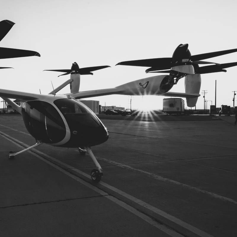 Electric vertical take‑off and landing (eVTOL) aircraft showcased in a display setting.