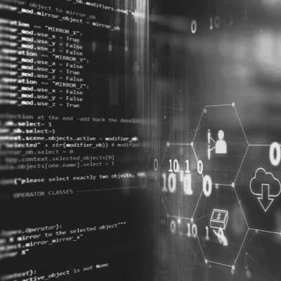 Close-up of a computer screen displaying programming code and development environment.